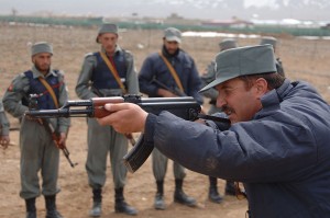Afghani troops using a Chinese copy of an AK-47 – one of the most rugged and mass-produced weapons in history.